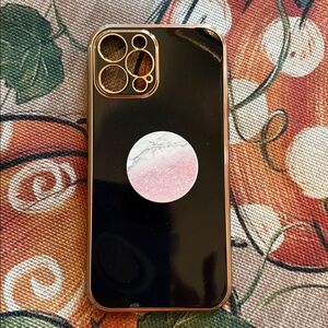 iPhone 12plus black and gold phone case Gently used